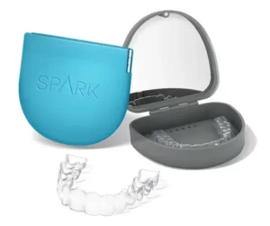 Spark Clear Aligners case with clear aligner trays, representing a discreet orthodontic treatment option for teens and adults at Griffin Orthodontics, Vernon, CT 06066.